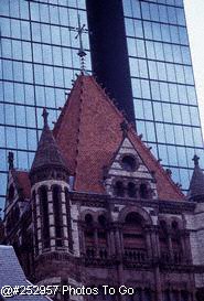 Old church next to skyscraper