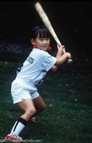 Girl Playing Baseball